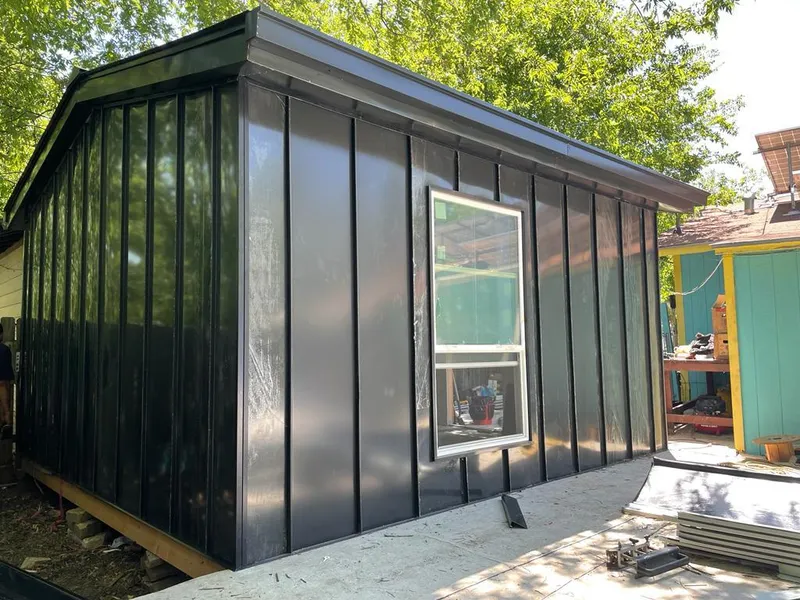 Black standing seam metal wall panels for Metal Roof Installation in South Beloit