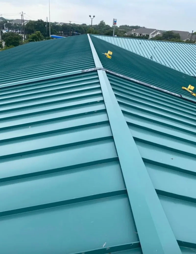 Green commercial metal roof ridge and valley for Metal Roof Repair in South Beloit