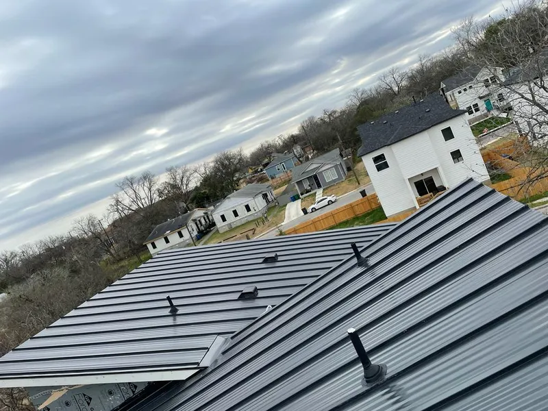 Standing seam metal roof panels with vents for Skylight Repair in South Beloit